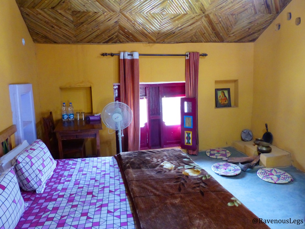 Bedroom with wood fire cooking set - Himachal Heritage Village, Palampur