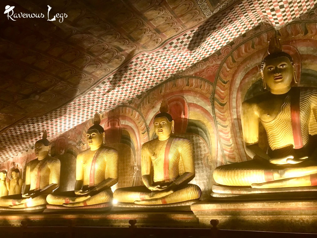 Buddha paintings & statues at Dambulla cave temple, Sri Lanka