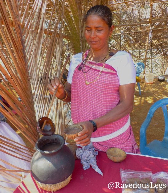 Woman serving Ambil at Goa Tribal Festival Xeldem