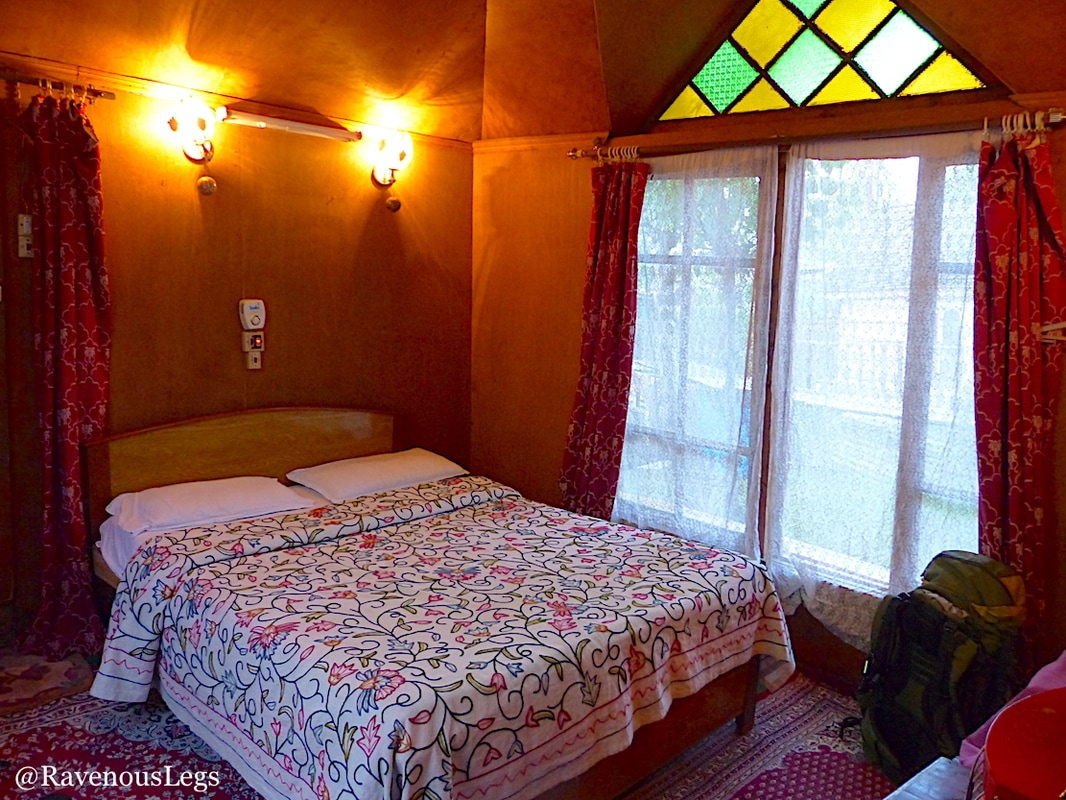 bedroom in houseboat on dal lake, kashmir