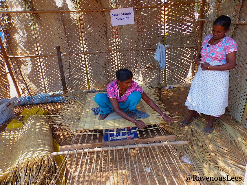 Women weaving mats at Goa Tribal Festival Xeldem
