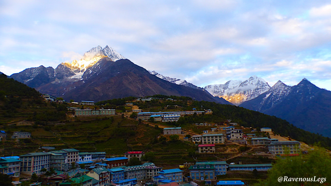 Mountains shining golden at sunset at Namche Bazaar - Everest Base Camp Trek