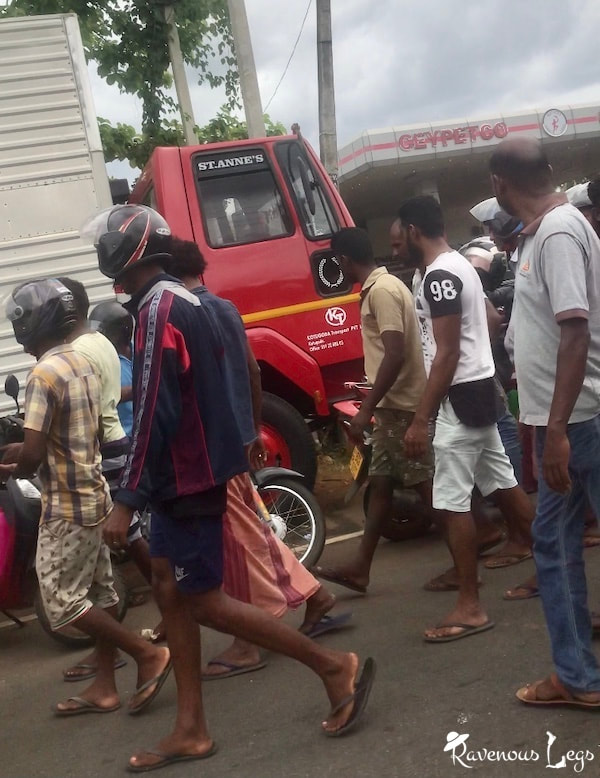 People in Sri Lanka waiting in long queues at fuel stations