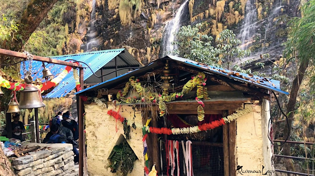 Waterfall & shrine of Pojo Nim Baraha worshipped by Gurungs -  Annapurna Base Camp trail